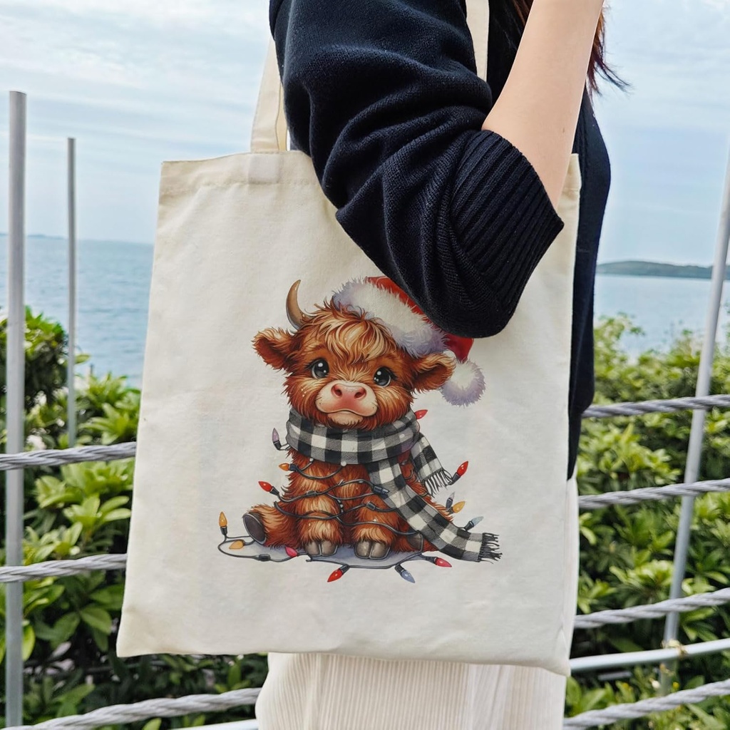 dlzdn-christmas-highland-cow-tote-bag-wi-2.jpg