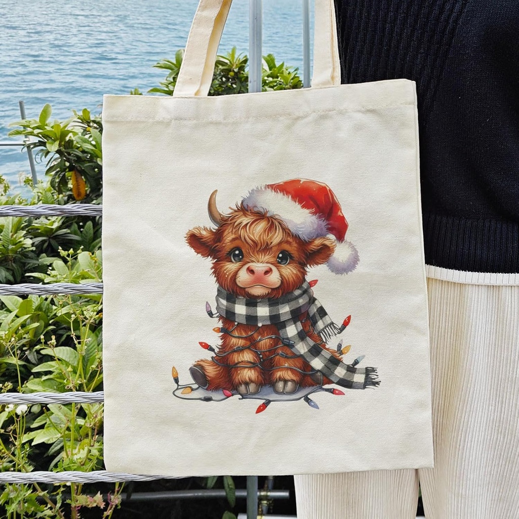 dlzdn-christmas-highland-cow-tote-bag-wi-3.jpg