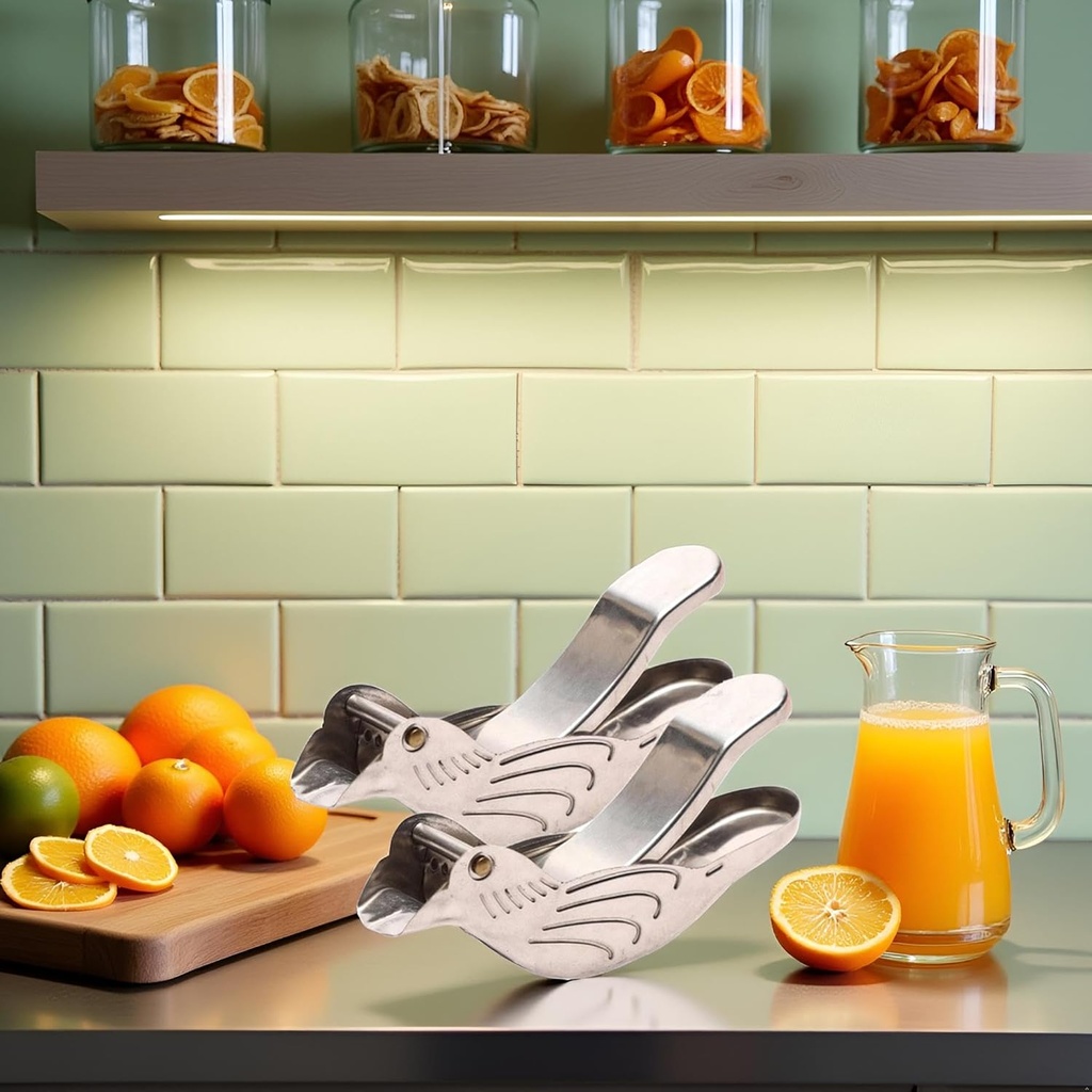 2-pcs-silver-bird-shape-lemon-juicer-sta-2.jpg