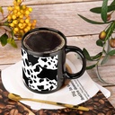 black-and-white-cow-print-travel-mug-cer-4.jpg