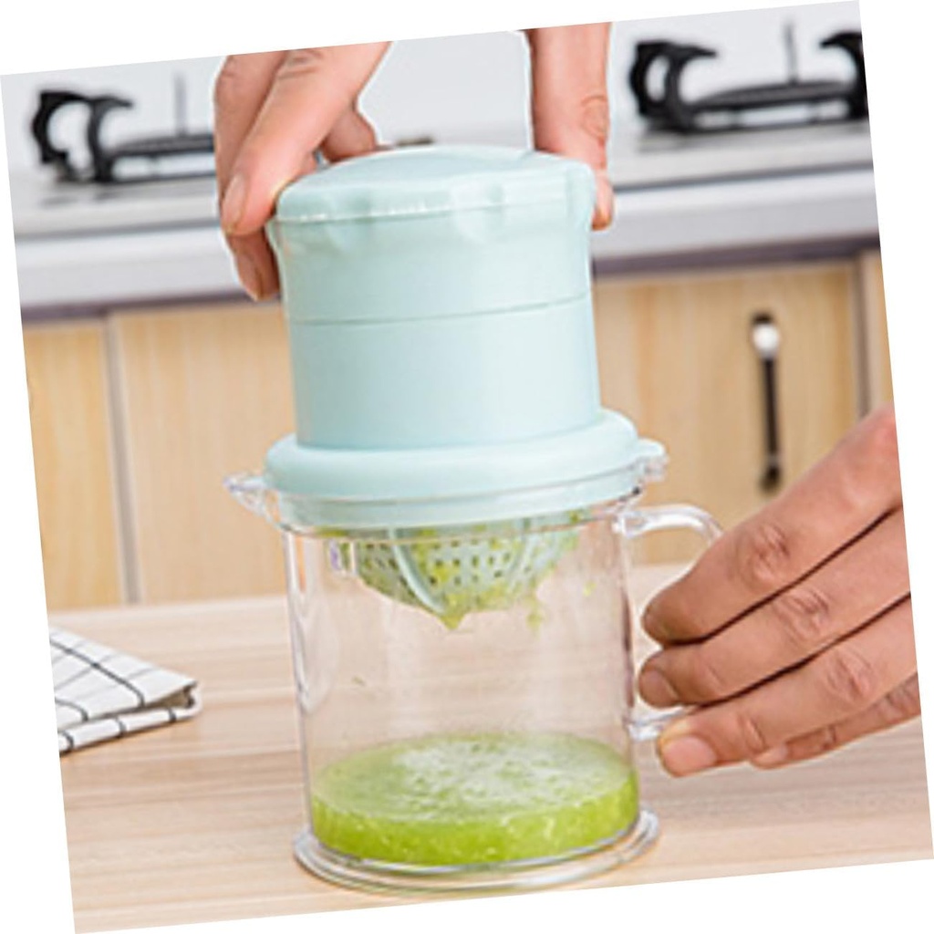 2-pcs-hand-press-fruit-squeezer-mini-veg-6.jpg