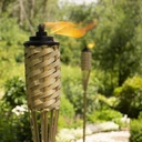tiki-bamboo-tiki-torches-12-pack-weather-5.jpg