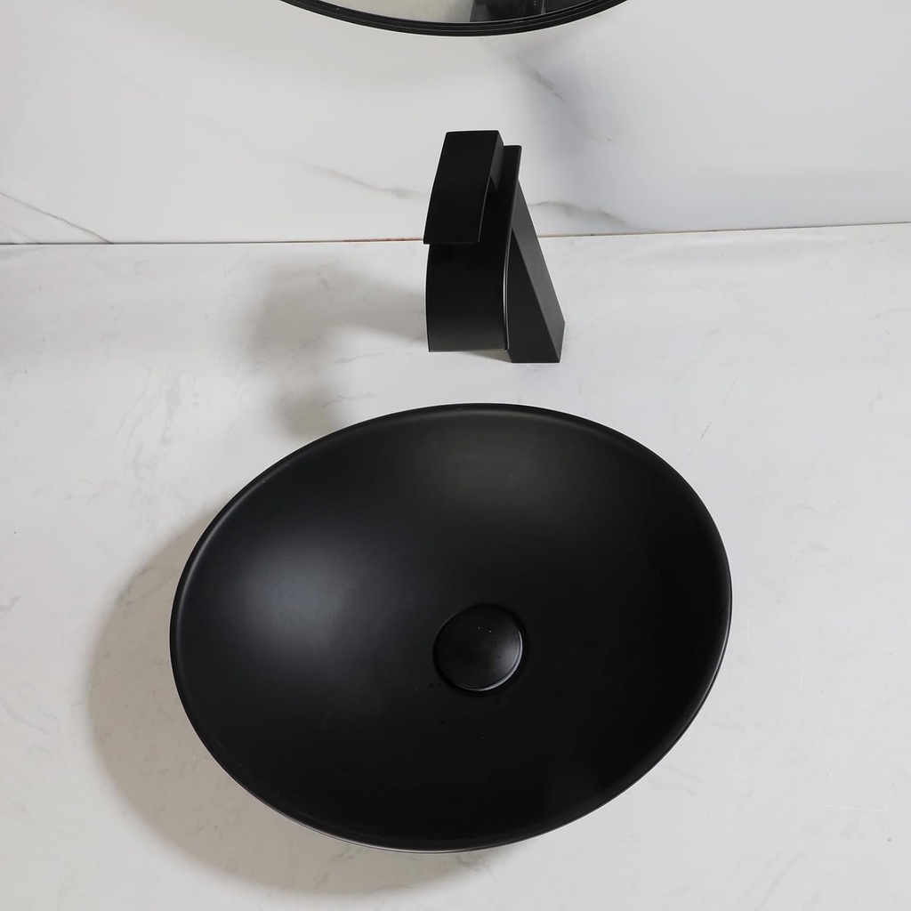 black-oval-bathroom-vessel-sink-with-fau-6.jpg