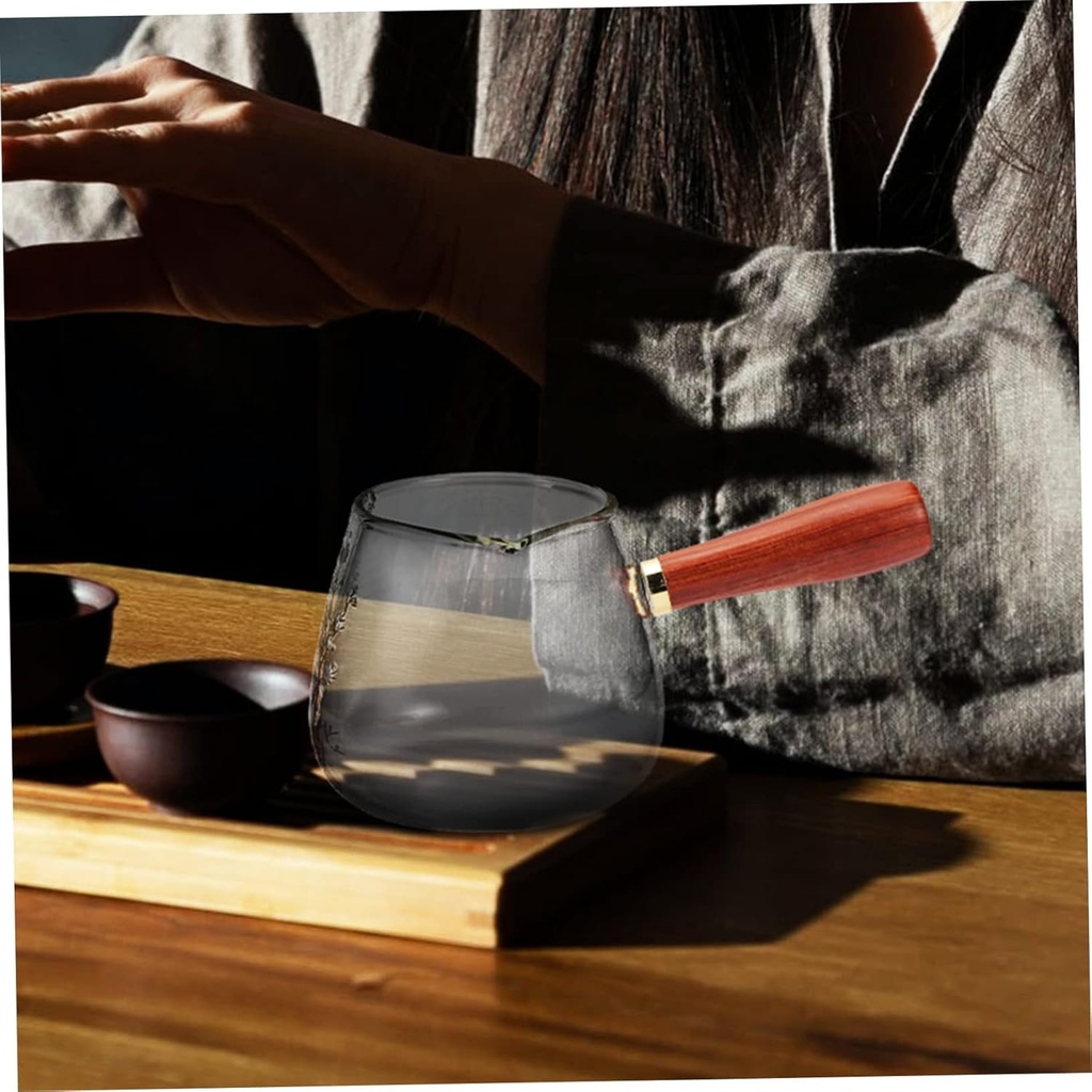 tea-dispenser-glass-cup-with-wooden-hand-6.jpg