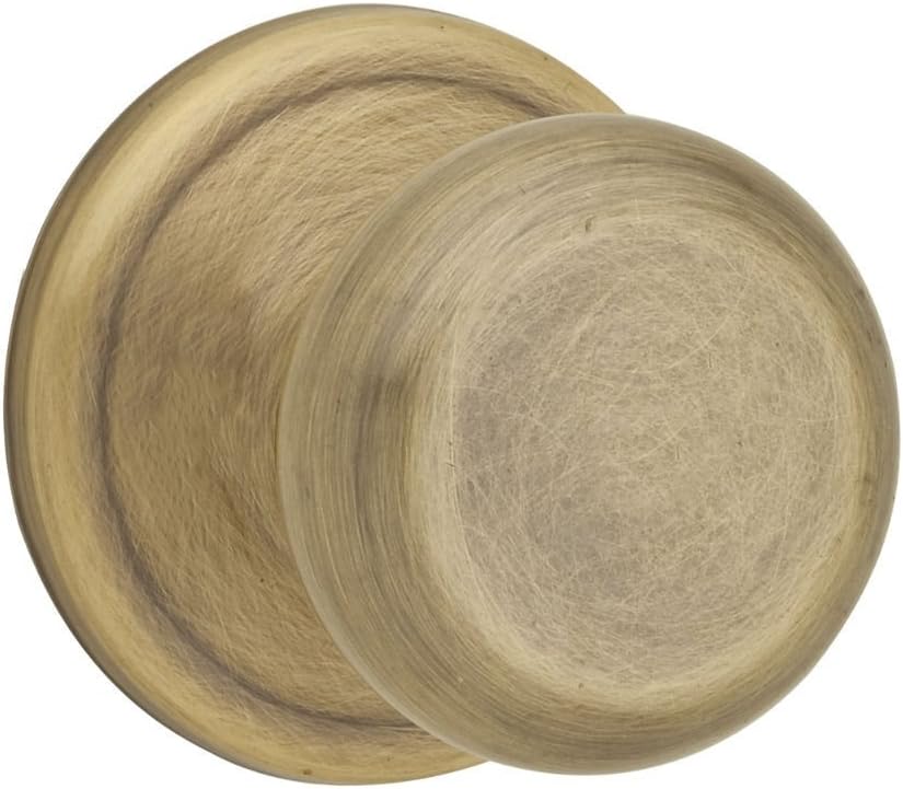 Kwikset Juno Interior Passage Door Knob, Handle for Closet and Hallway Doors, Non-Locking Doorknob in Antique Brass, with Microban Protection (Pack of 6)