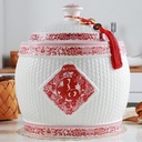 Ceramic Rice Container, Chinese Ceramic Rice Storage Jar, Airtight Grain Dispenser, Handcrafted Kitchen Canister with Traditional Red Tassel Design, Suitable for Grain, Flour, and Dry Food Storage(26*